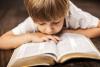 Child reading the bible