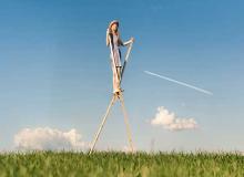 Girl walking on stilts