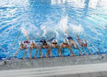 Children learning to swim
